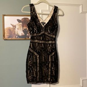 Like new BeBe black and light gold dress.  Worn once.